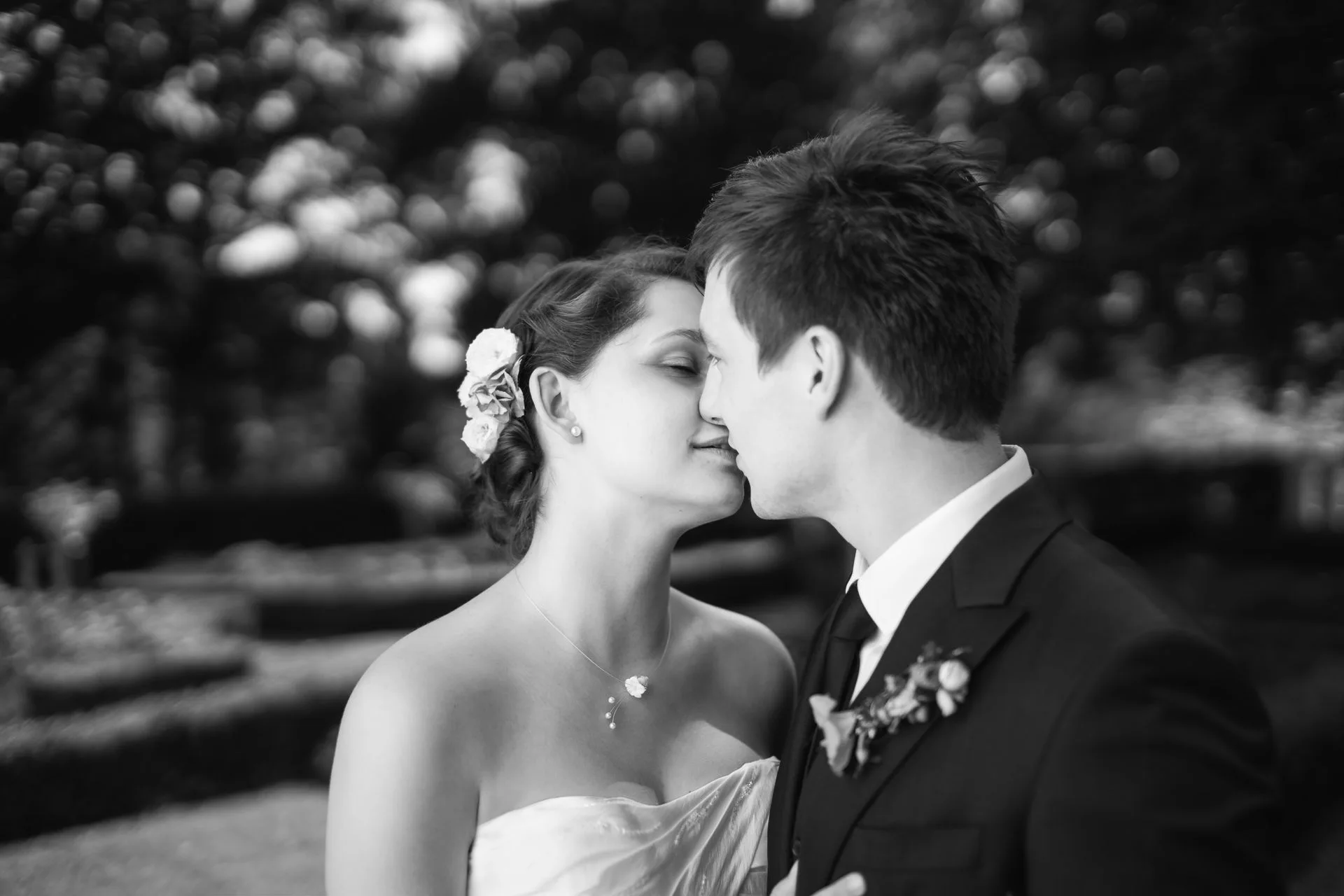 Intimate ceremony kiss in nature