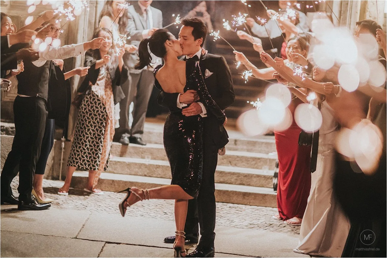Sparkler exit kiss at the end of the Hotel de Rome wedding